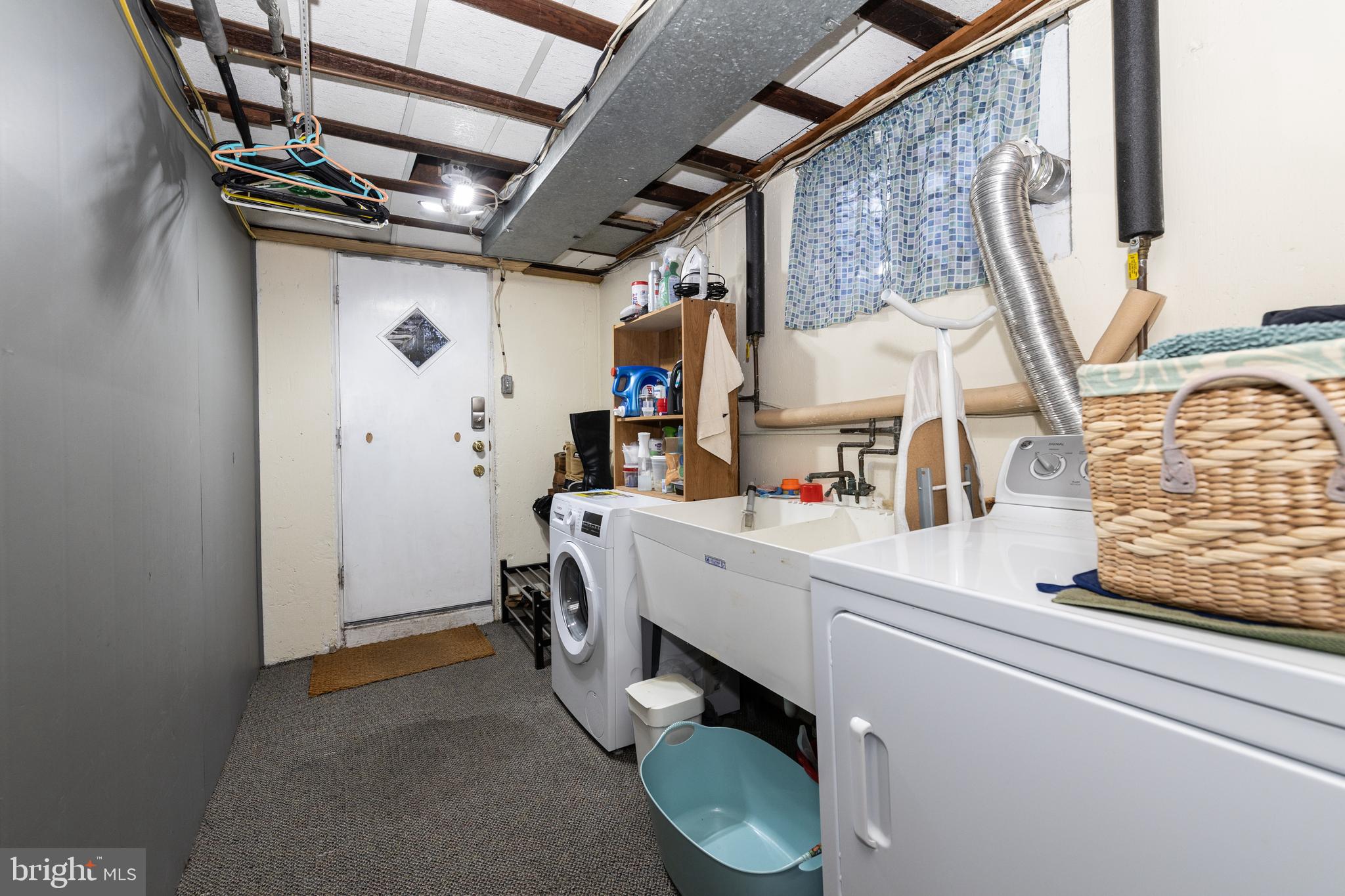52 Woodbine Road Havertown, PA 19083 - Photo 32 of 38 a utility room with dryer and washer