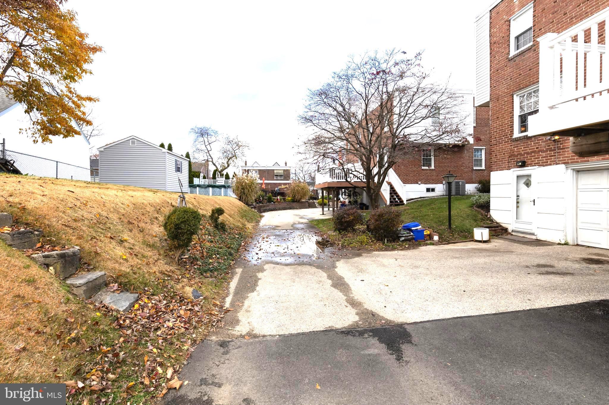 52 Woodbine Road Havertown, PA 19083 - Photo 37 of 38 a view of a street with a building in the background