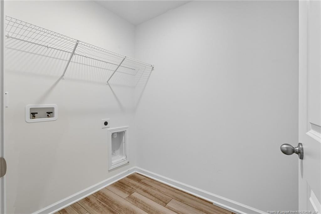 28 White Hart Court Angier, NC 27501 - Photo 29 of 36 a view of a room with racks on the wall