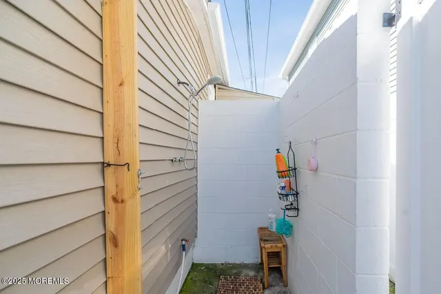 a living room with furniture flowerpot and a potted plant