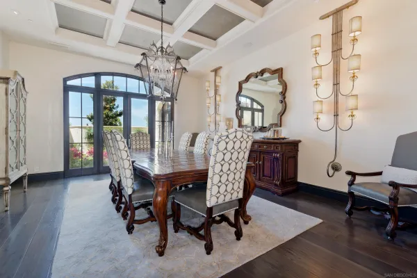 a view of a dining room with furniture and window