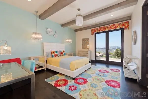 a view of a house with swimming pool and furniture
