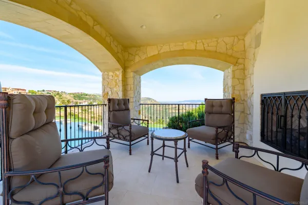 a view of a house with backyard porch and patio