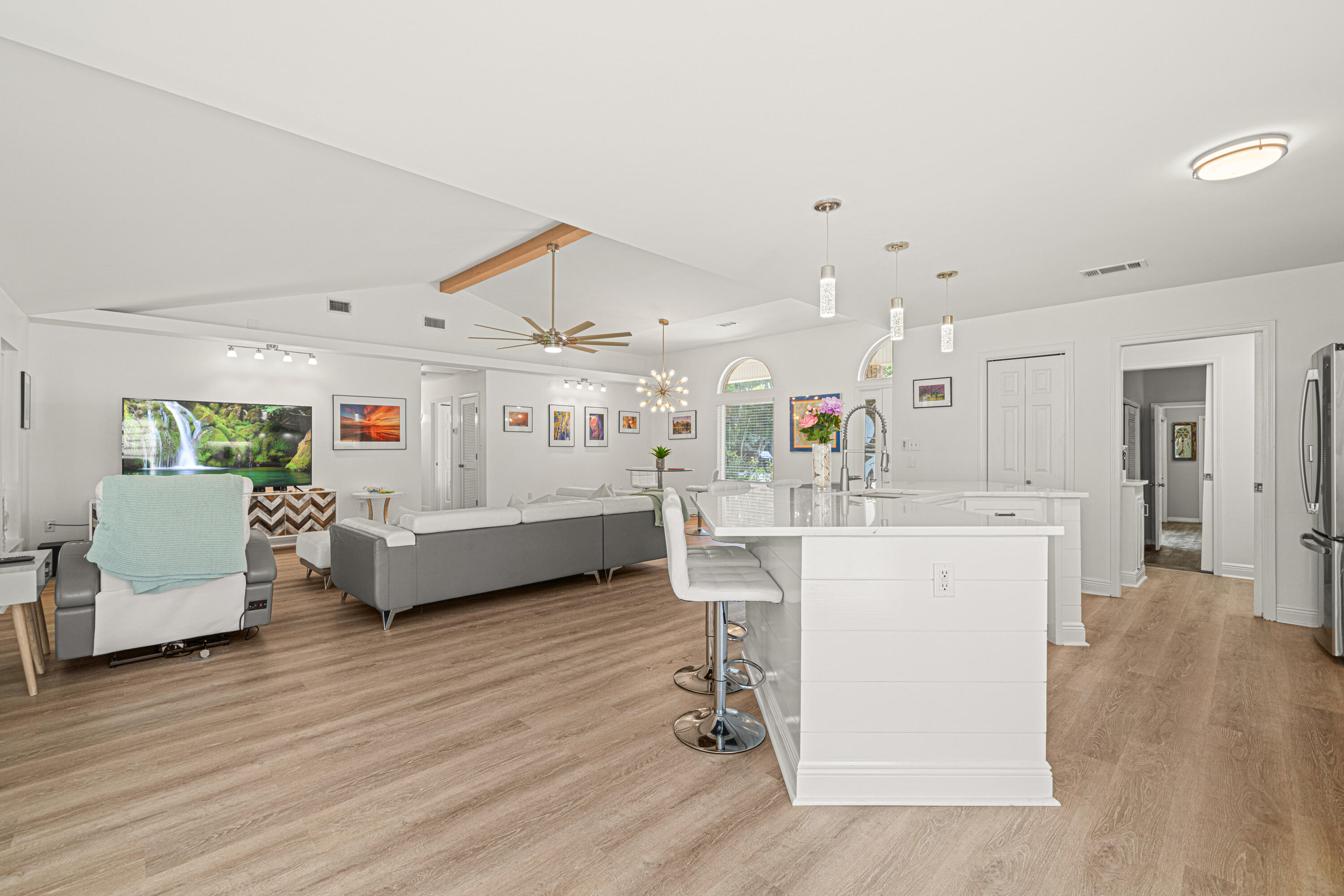 216 Santa Barbara Avenue Santa Rosa Beach, FL 32459 - Photo 35 of 85 a living room with furniture and a wooden floor