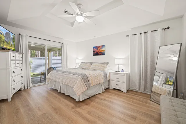 a bathroom with a shower sink and mirror