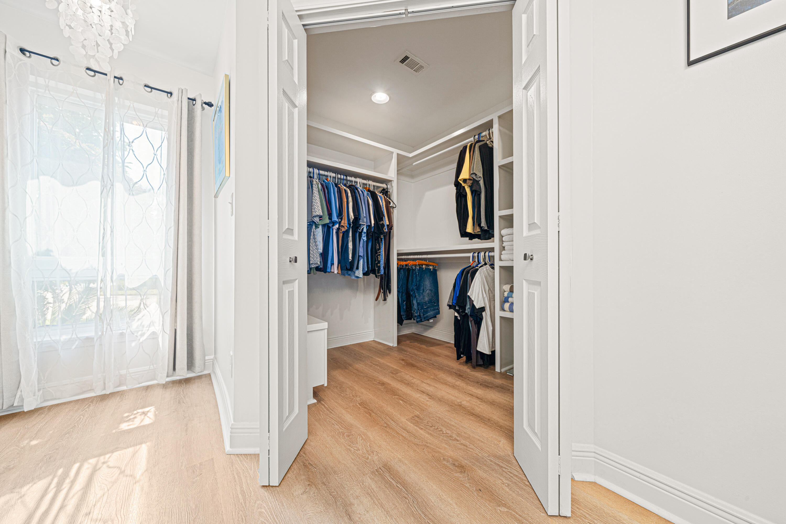 216 Santa Barbara Avenue Santa Rosa Beach, FL 32459 - Photo 47 of 85 a view of hallway with furniture and closet