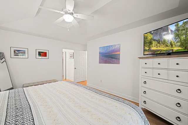 a utility room with stainless steel appliances lots of furniture and toys