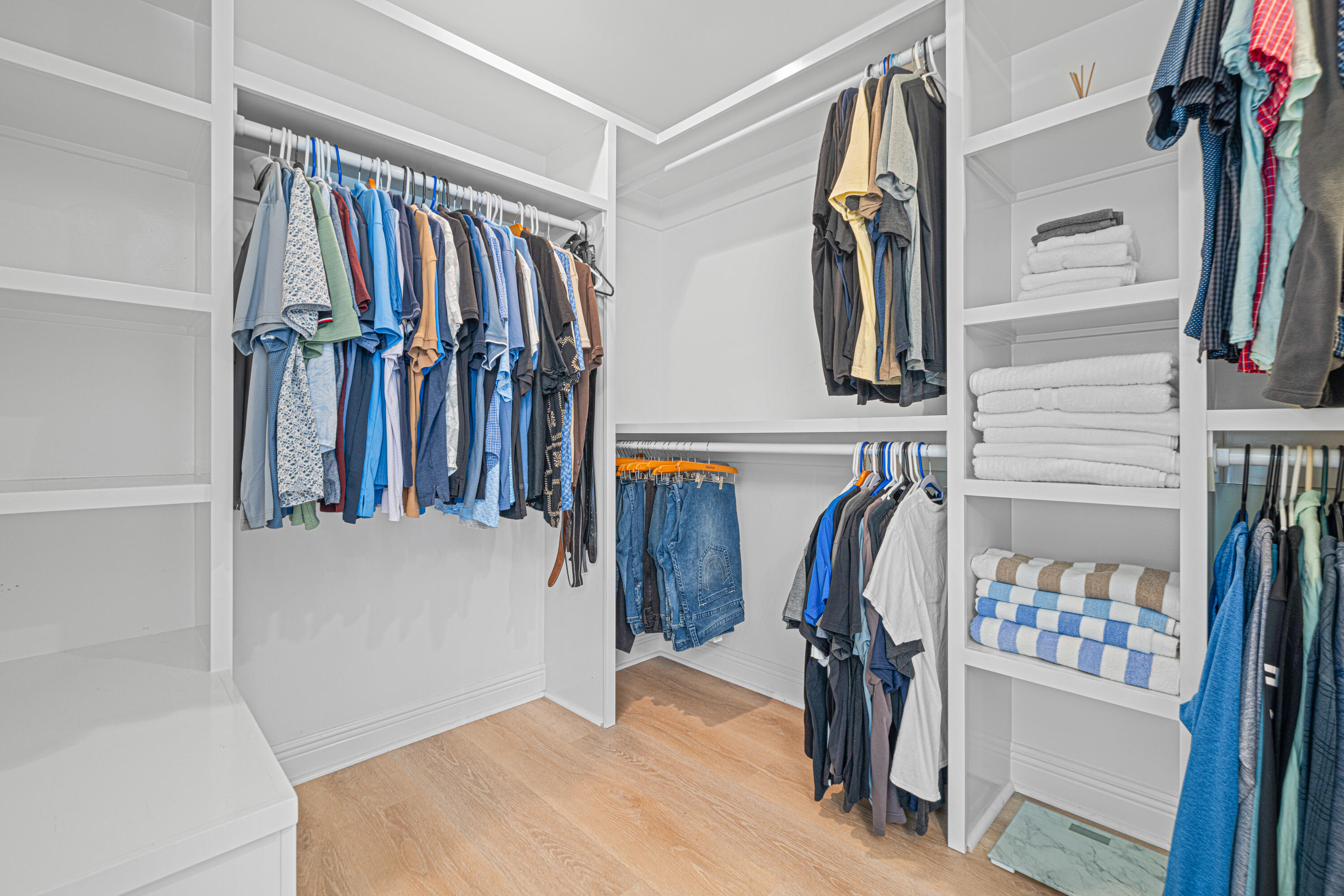 216 Santa Barbara Avenue Santa Rosa Beach, FL 32459 - Photo 48 of 85 a view of walk in closet with clothes and shoes