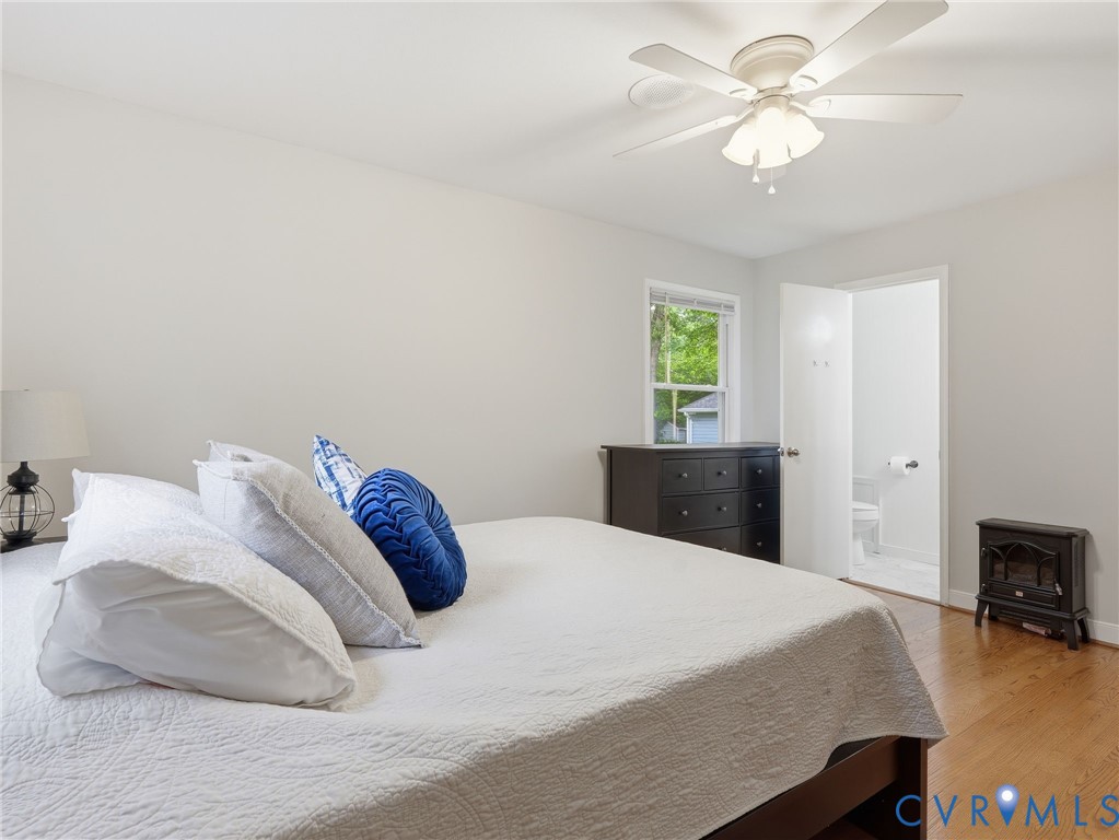 7707 Woodbrook Road Quinton, VA 23141 - Photo 28 of 42 Bedroom featuring wood-finish flooring, a ceiling