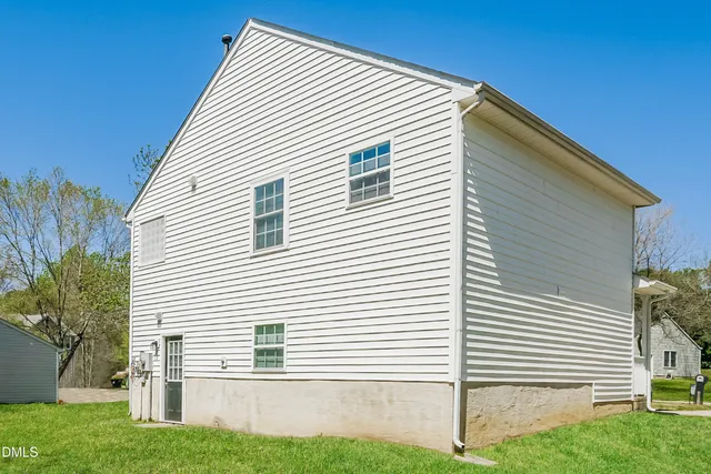 a picture of a bench in a white building