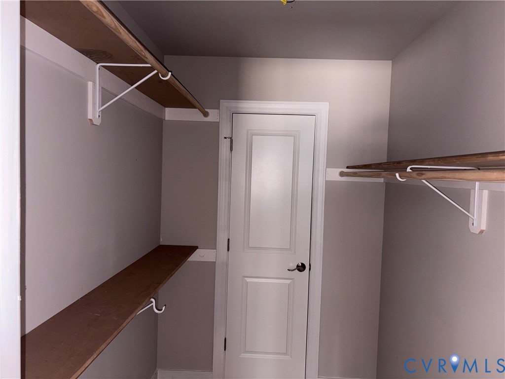 24178 Cabin Point Road Waverly, VA 23890 - Photo 7 of 14 a view of an empty walk in closet