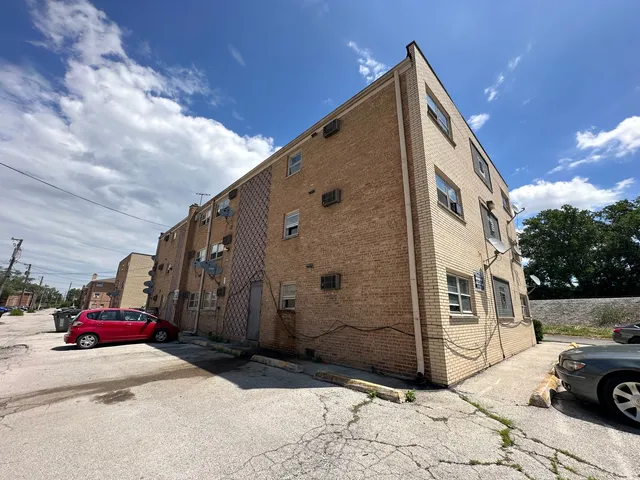 a view of street with parked cars