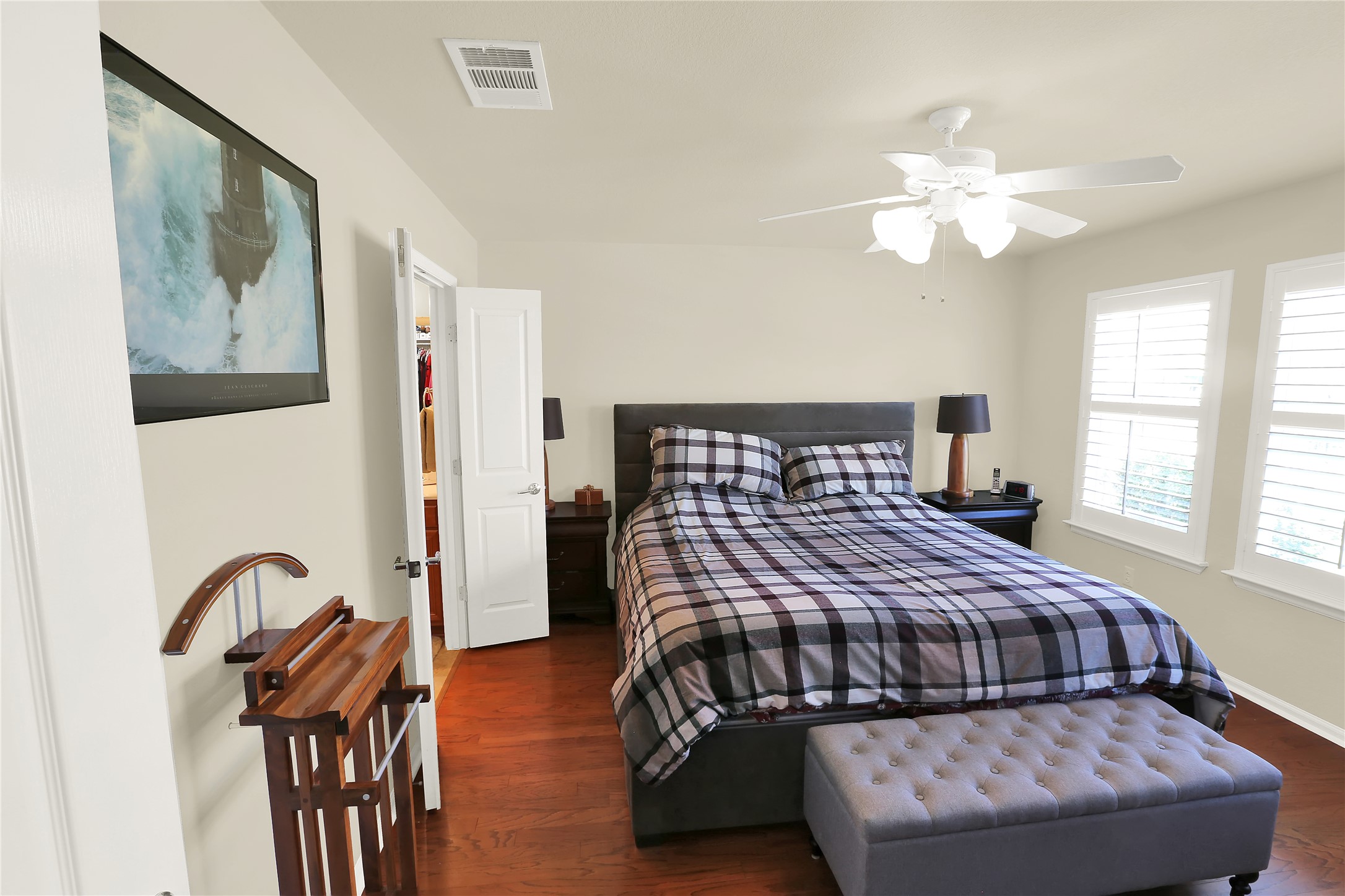 104 Sheldon Lake Drive Georgetown, TX 78633 - Photo 12 of 40 a bedroom with bed and wooden floor