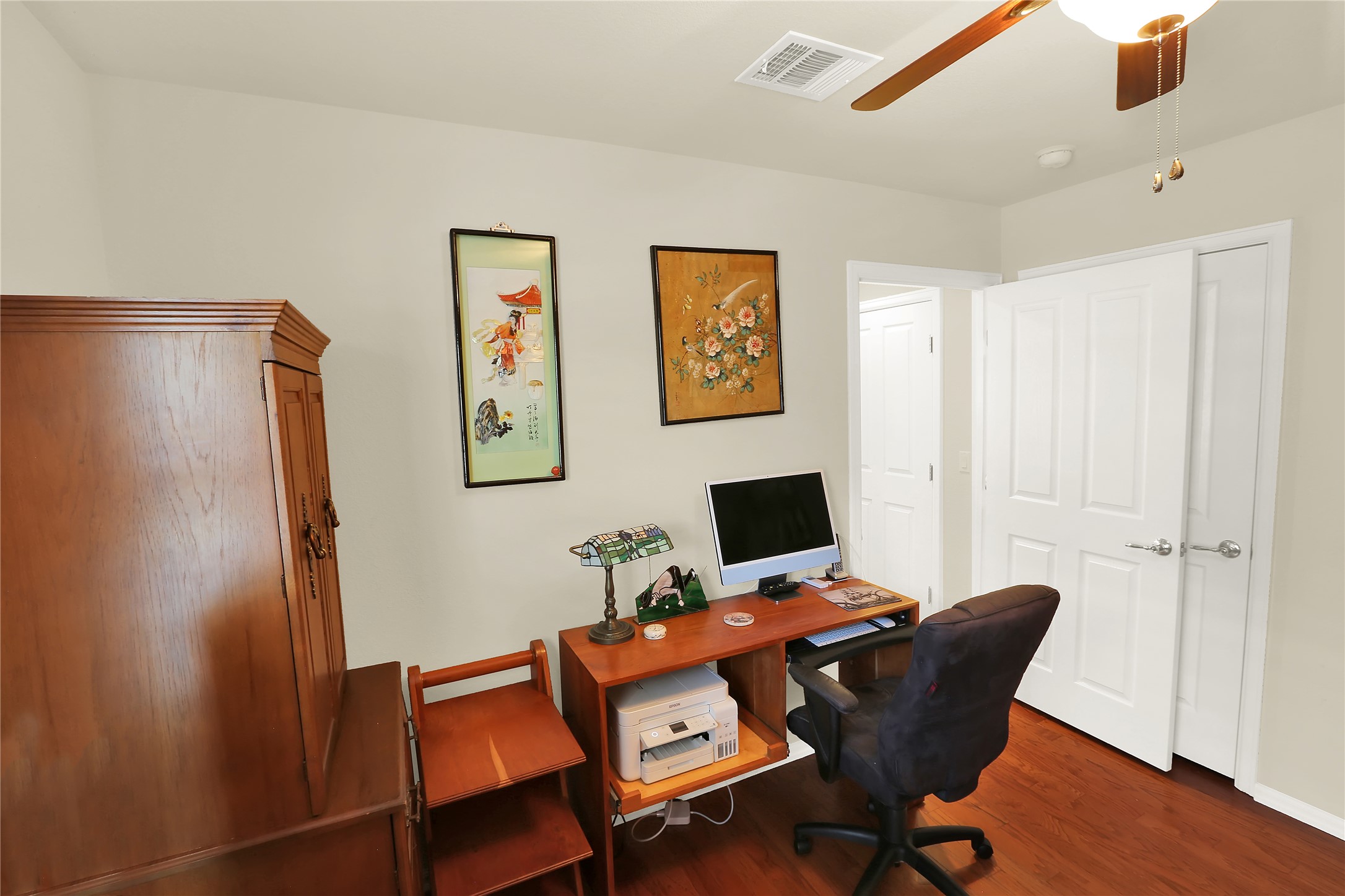 104 Sheldon Lake Drive Georgetown, TX 78633 - Photo 21 of 40 a view of a workspace with furniture and wooden floor
