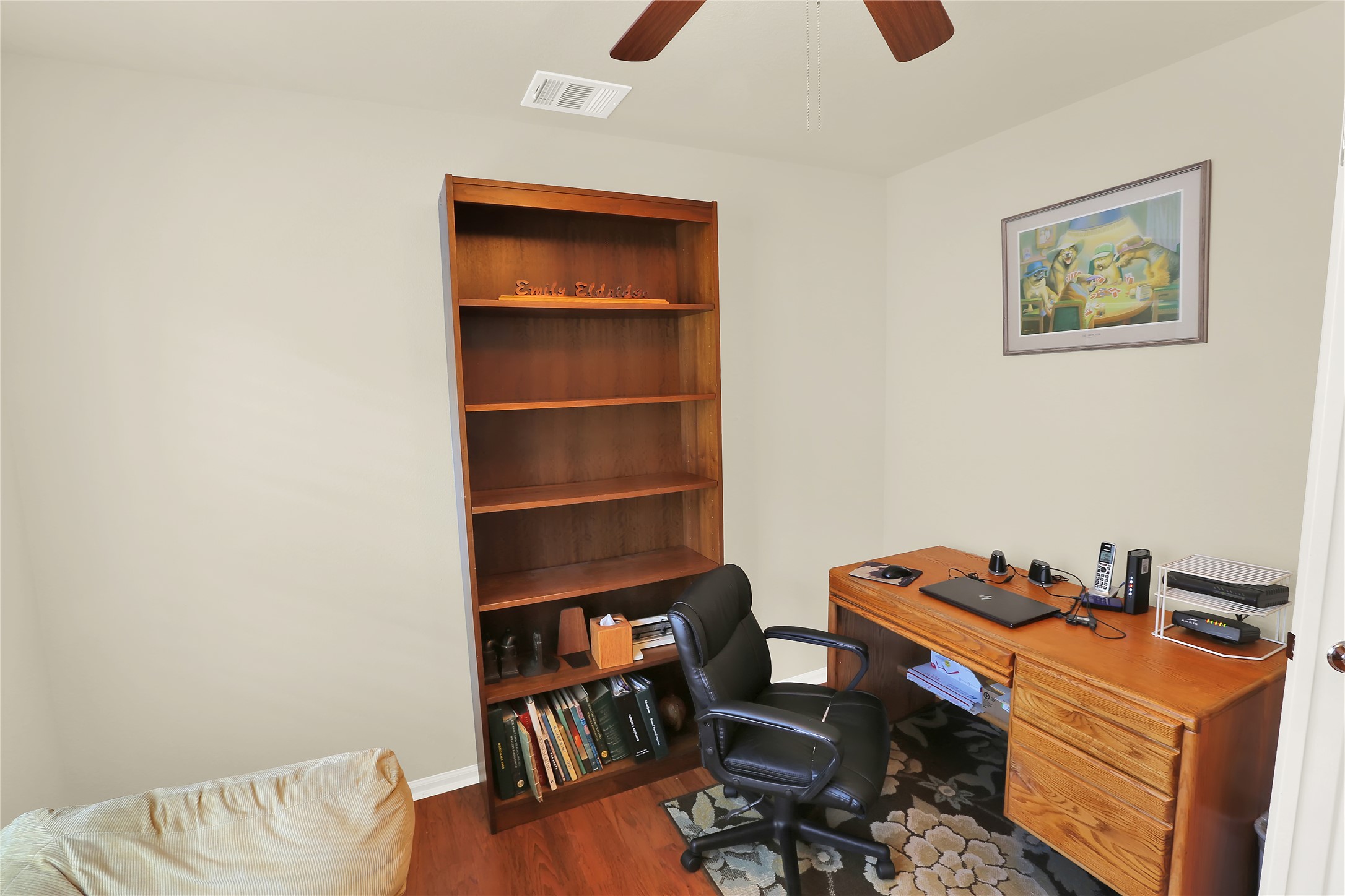 104 Sheldon Lake Drive Georgetown, TX 78633 - Photo 25 of 40 a room with furniture and a book shelf