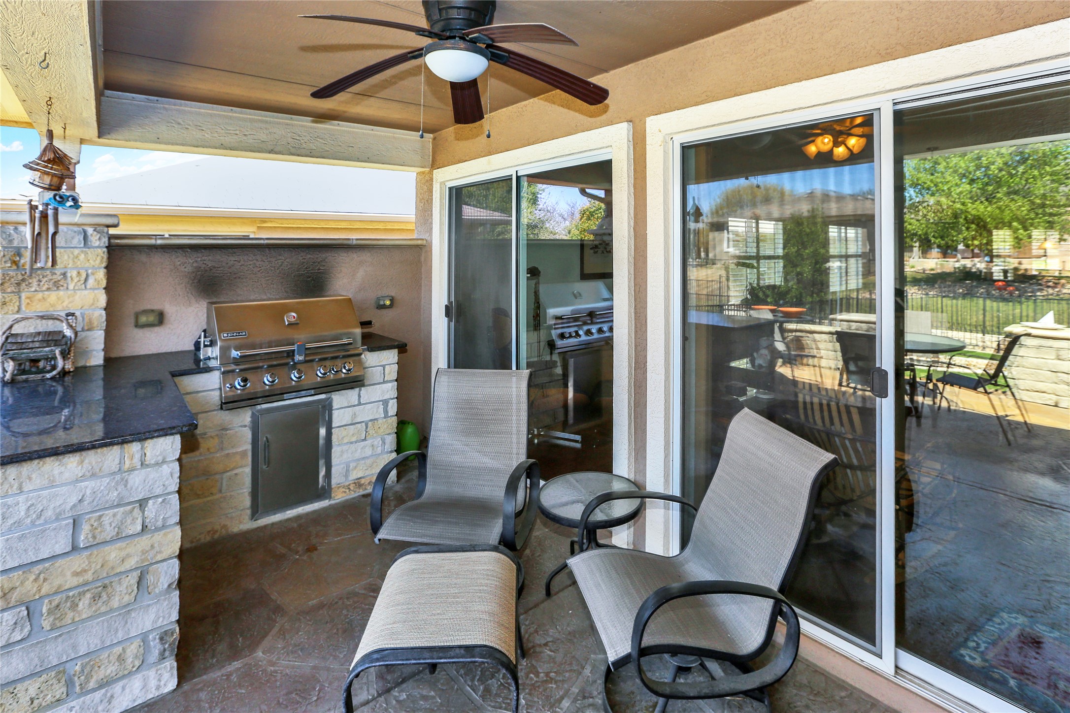 104 Sheldon Lake Drive Georgetown, TX 78633 - Photo 27 of 40 a kitchen with a table chairs stove and cabinets