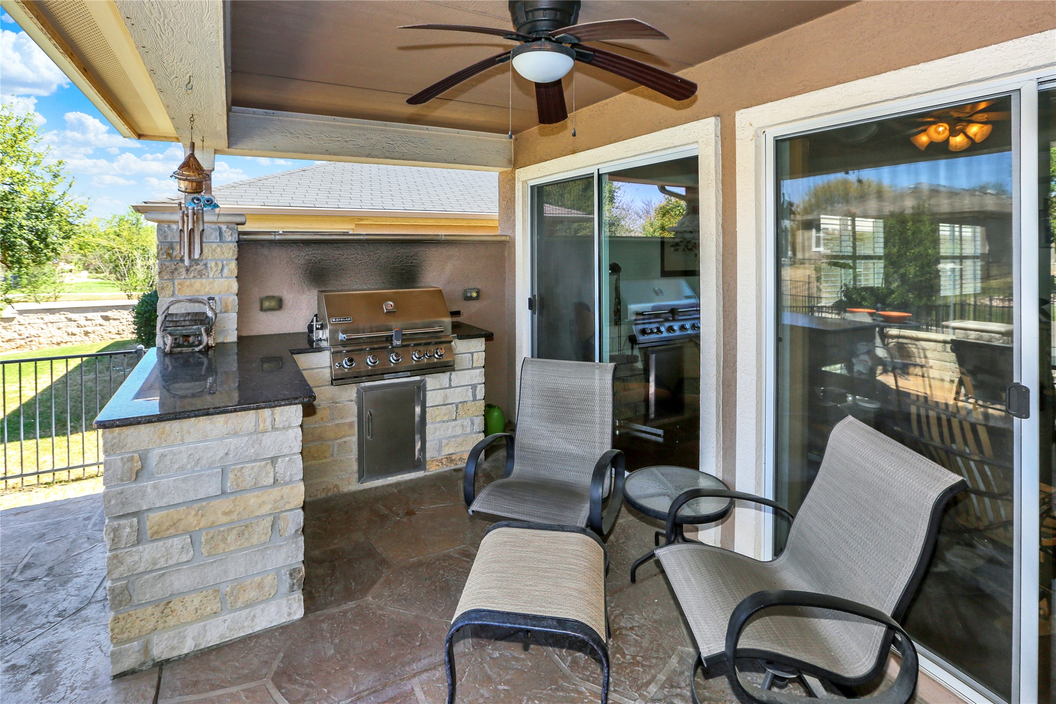 104 Sheldon Lake Drive Georgetown, TX 78633 - Photo 28 of 40 a kitchen with a table chairs and a stove