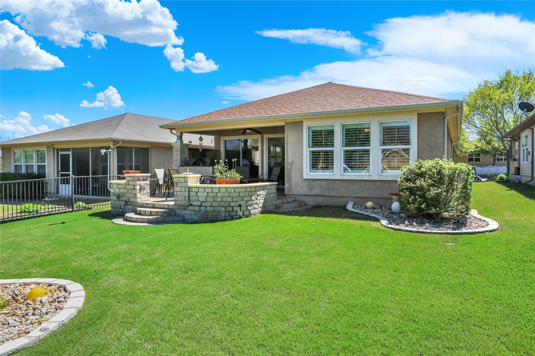 104 Sheldon Lake Drive Georgetown, TX 78633 - Photo 29 of 40 a front view of a house with patio and garden