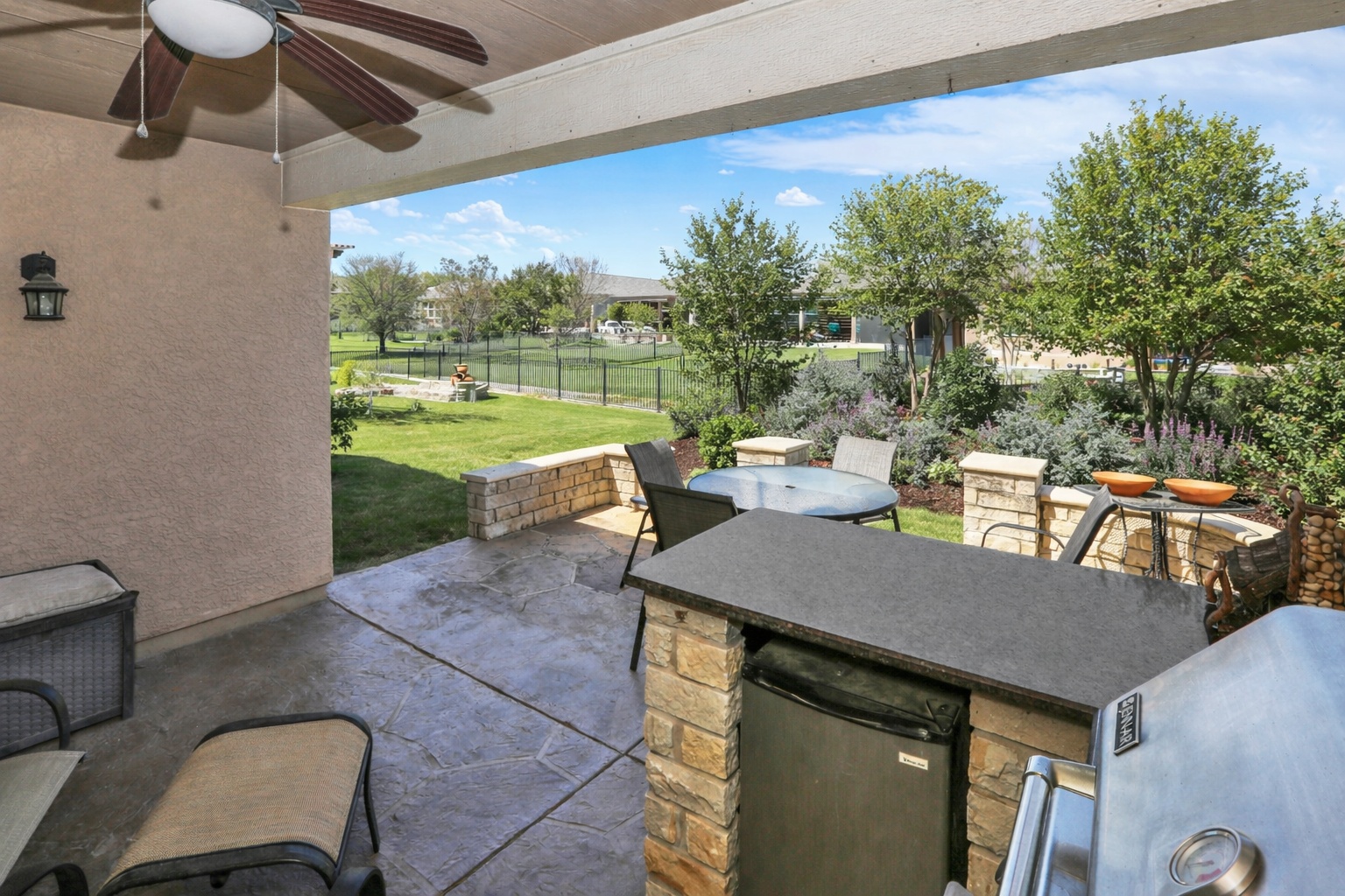 104 Sheldon Lake Drive Georgetown, TX 78633 - Photo 2 of 40 a view of a patio with table and chairs and a barbeque