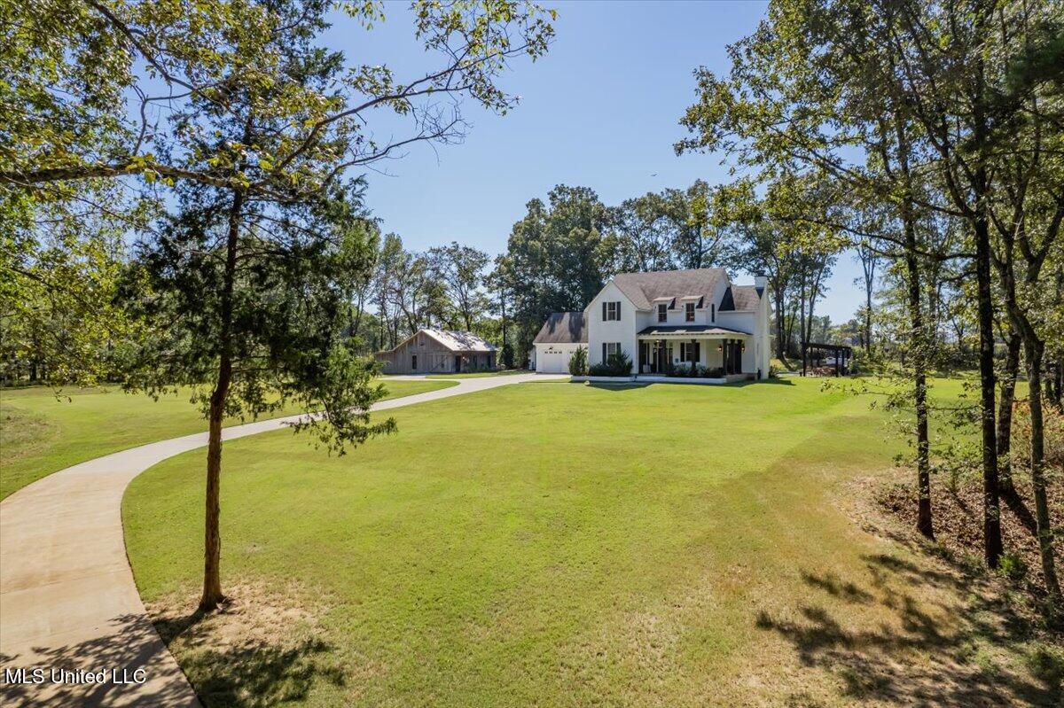 1037 Hogan Road Holly Springs, MS 38635 - Photo 3 of 68 16-16-1037 Hogan Rd
