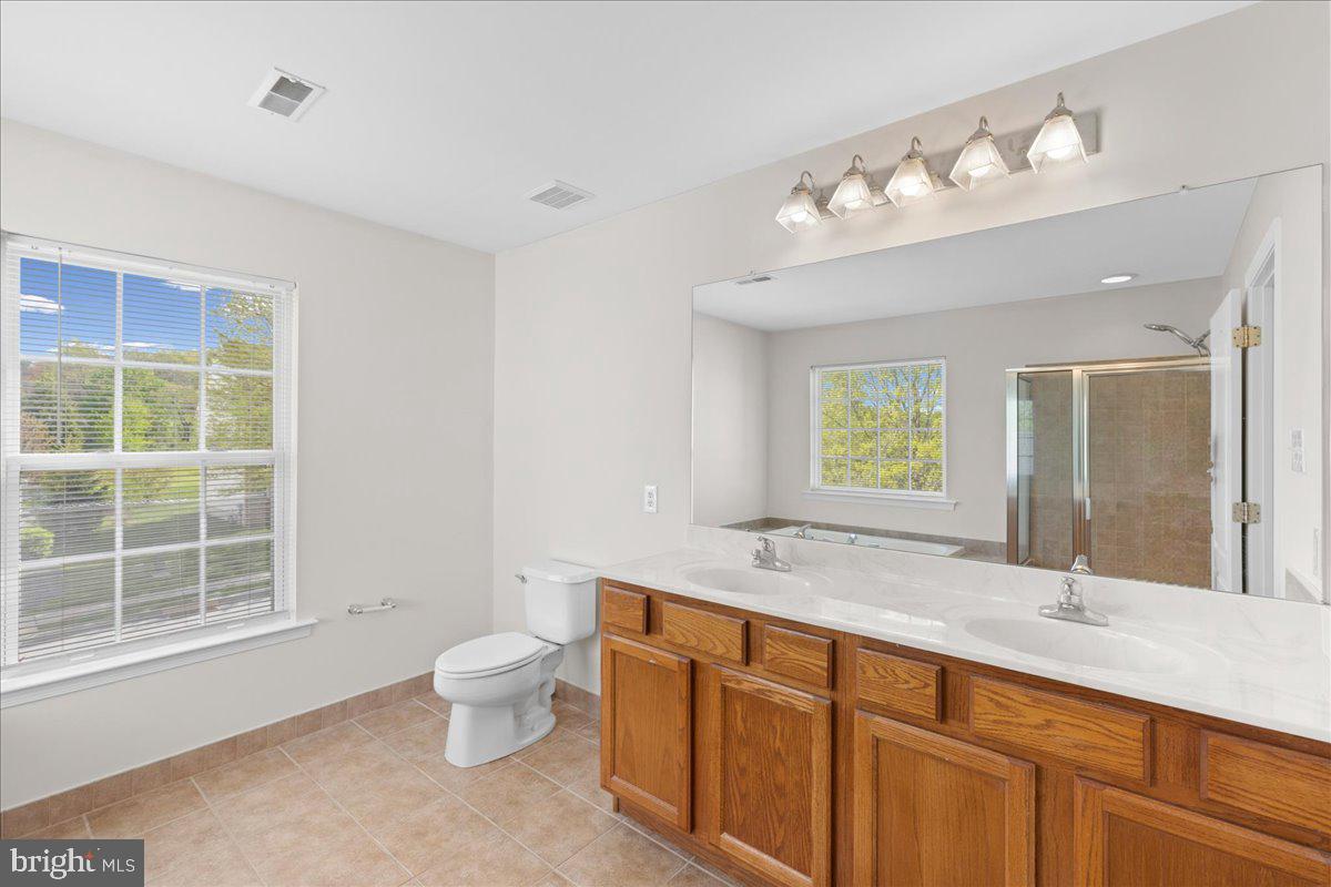 1437 Balmoral Road Coatesville, PA 19320 - Photo 14 of 52 Bright and airy modern bathroom retreat.