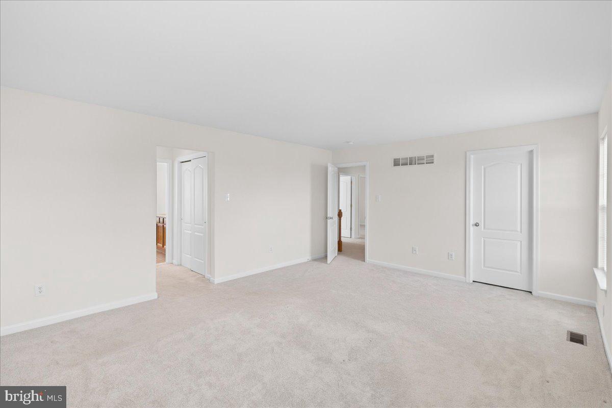 1437 Balmoral Road Coatesville, PA 19320 - Photo 15 of 52 Spacious, versatile living area awaits.