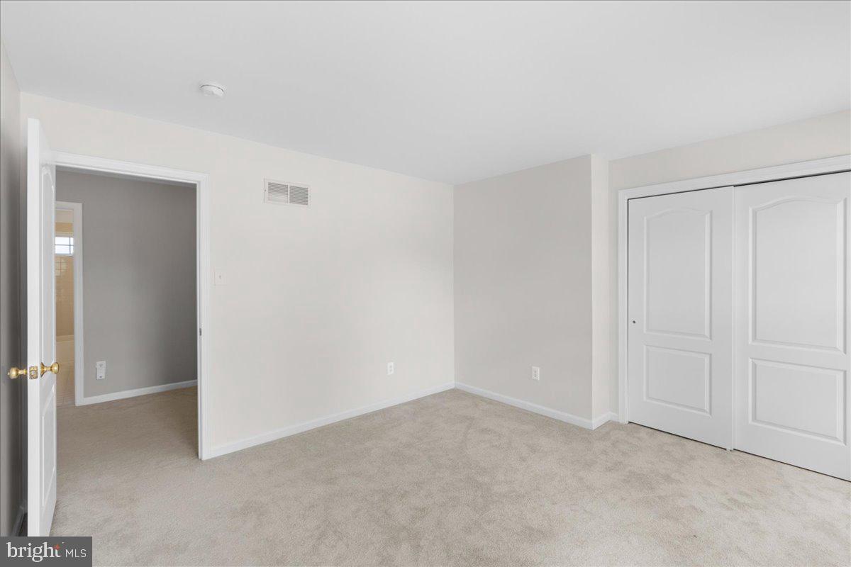 1437 Balmoral Road Coatesville, PA 19320 - Photo 25 of 52 Spacious, light-filled room awaits you.