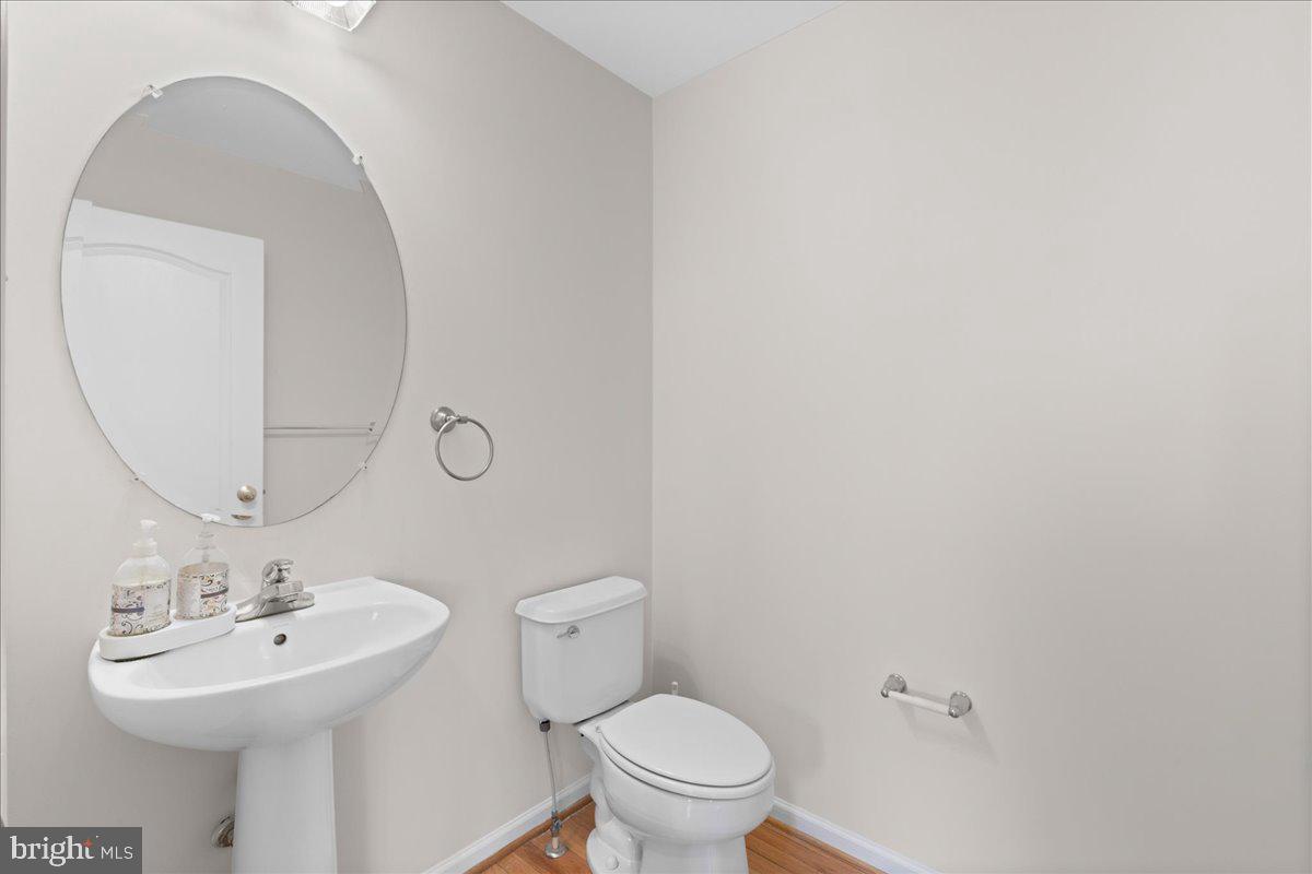 1437 Balmoral Road Coatesville, PA 19320 - Photo 27 of 52 Sleek and modern powder room design.