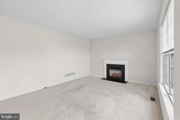 a view of a chandelier in an empty room