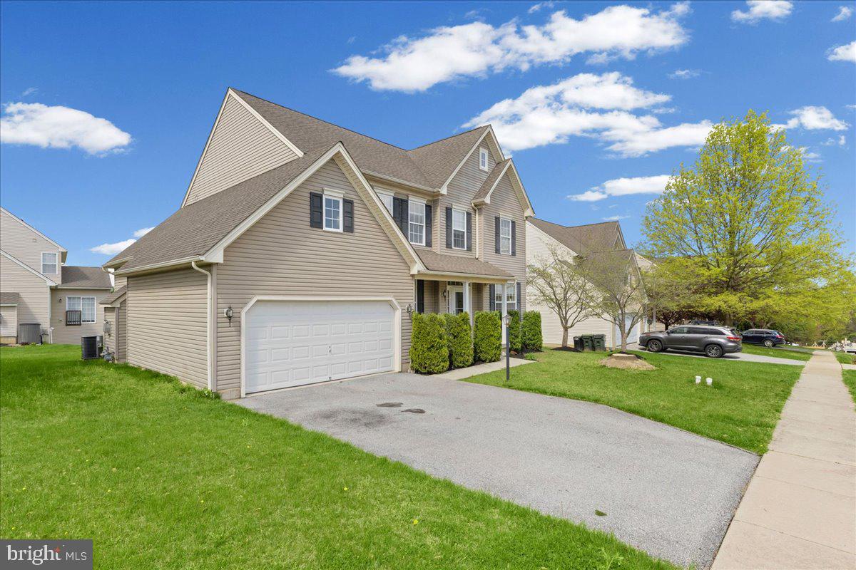 1437 Balmoral Road Coatesville, PA 19320 - Photo 42 of 52 Charming home with lush green lawn.