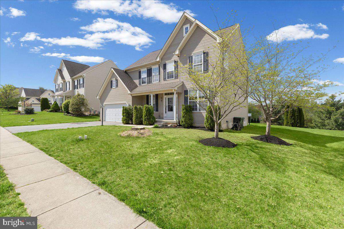 1437 Balmoral Road Coatesville, PA 19320 - Photo 43 of 52 Charming home with lush green lawn.