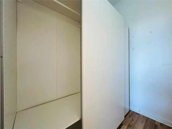 a bathroom with a toilet a sink and shower