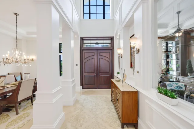 a view of a livingroom with furniture and a window
