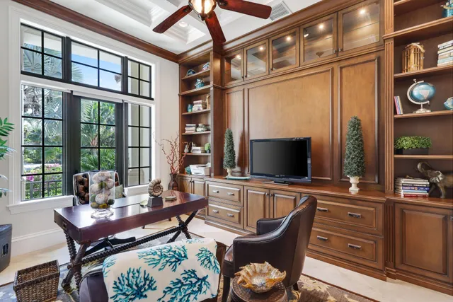 a large bathroom with a double vanity sink mirror and bathtub