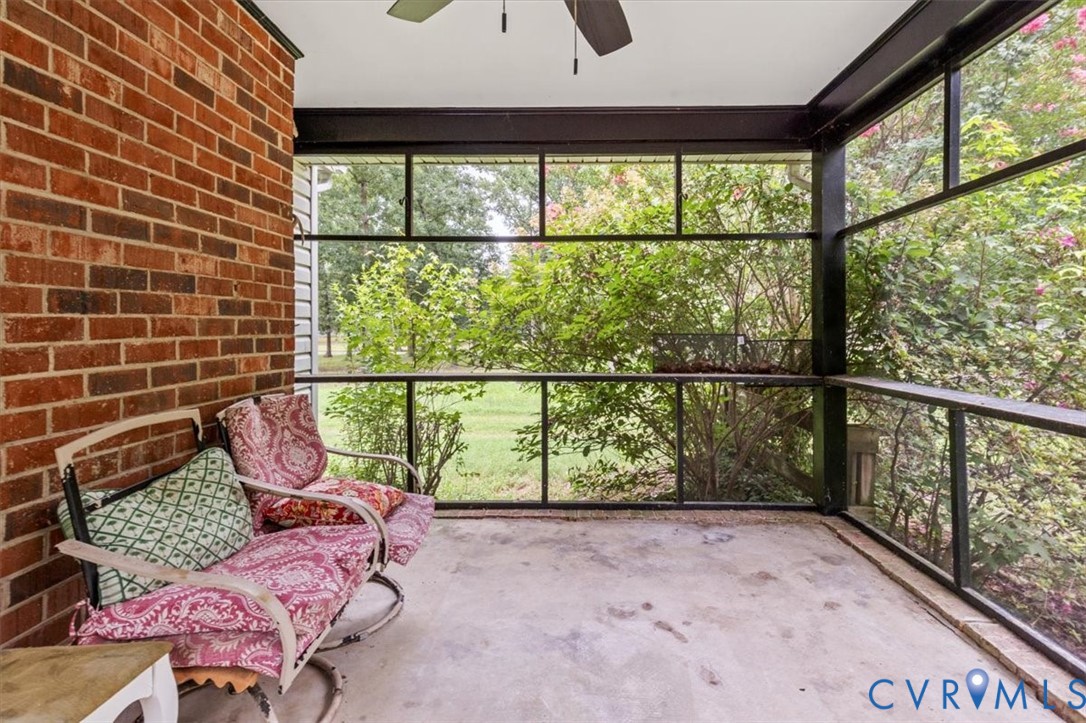 20101 River Road Chesterfield, VA 23838 - Photo 14 of 44 Screened porch with a brick exterior wall, concret