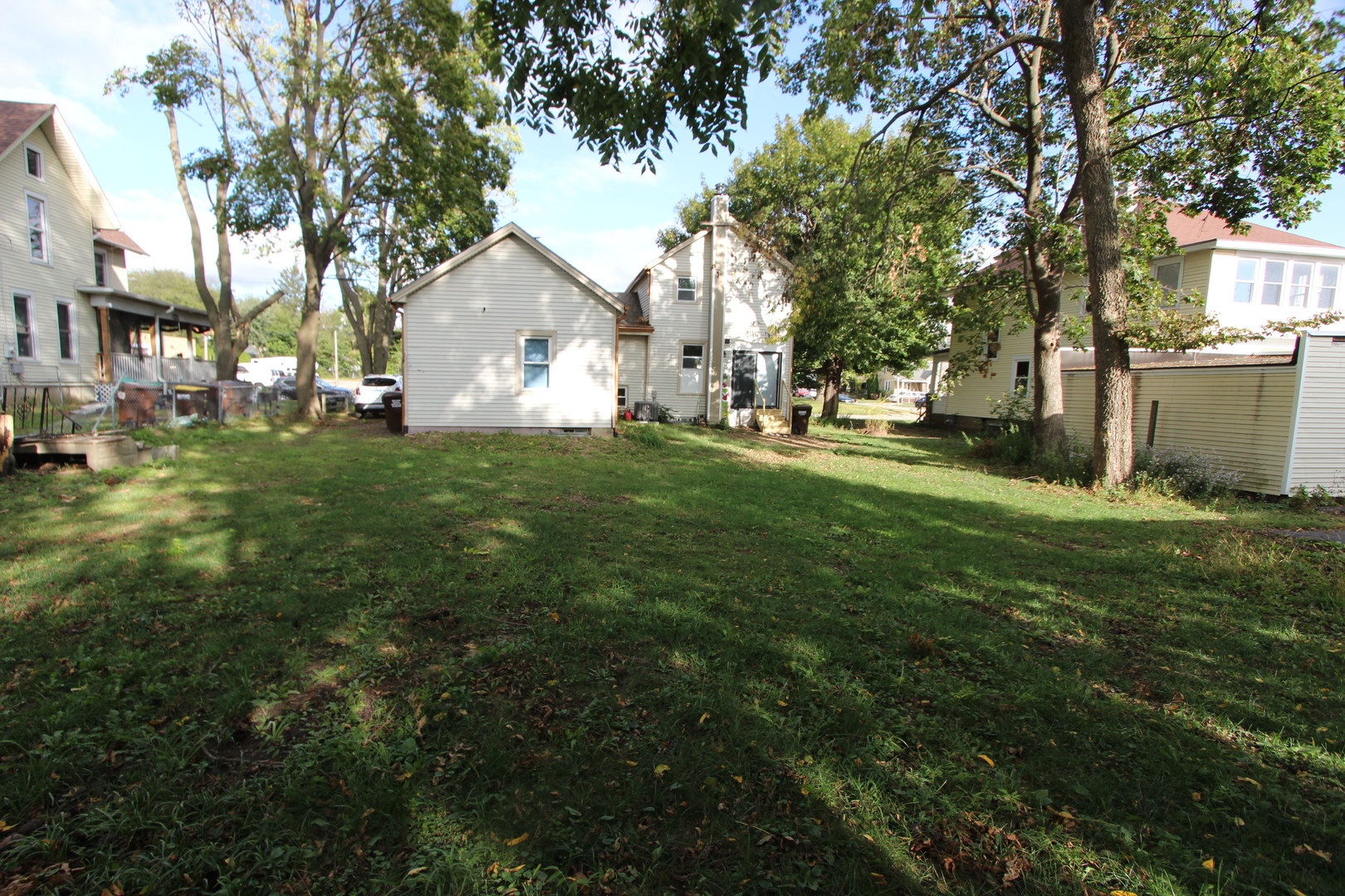 633 1/2 Whitney Boulevard Belvidere, IL 61008 - Photo 15 of 16 a view of a house with a yard