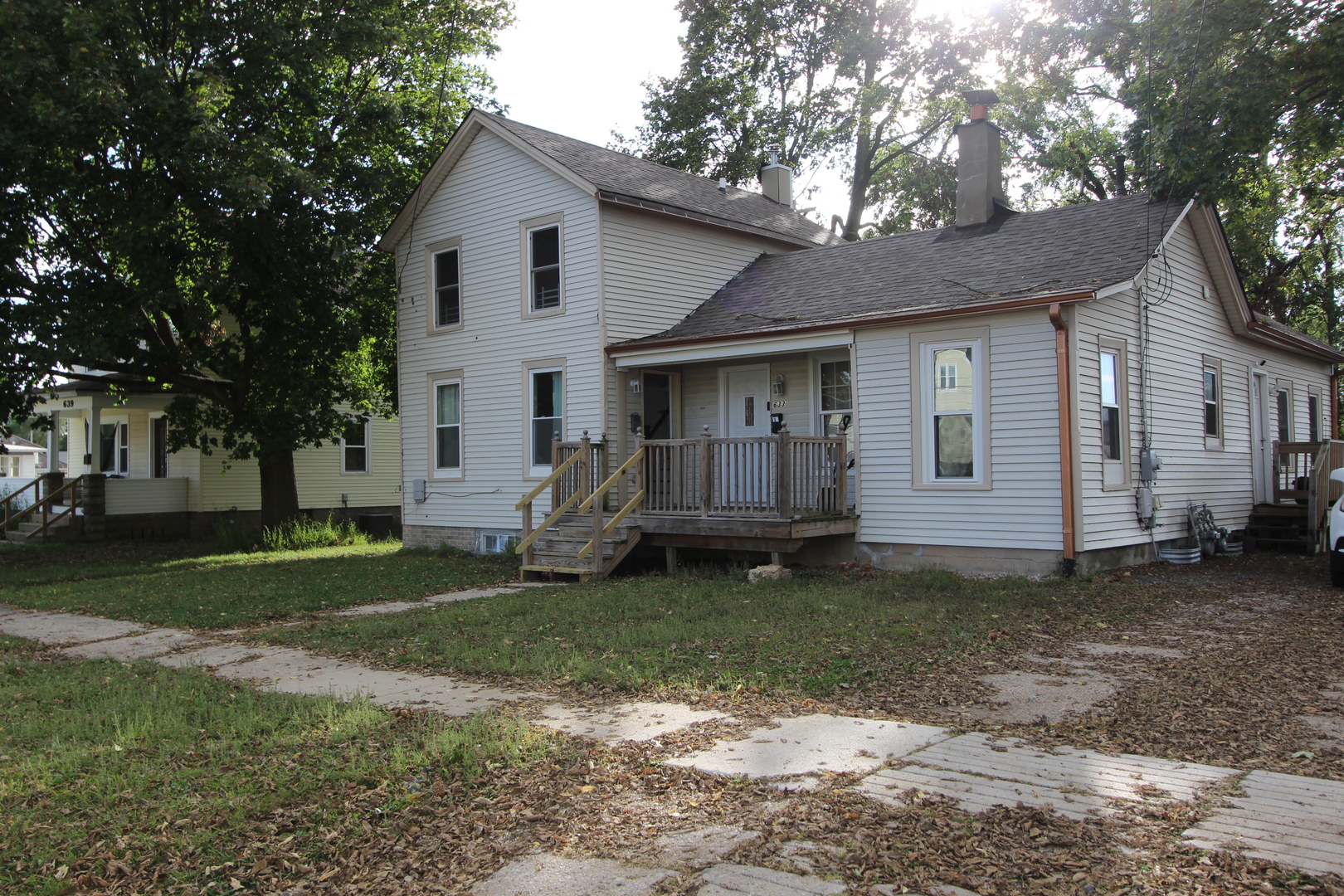633 1/2 Whitney Boulevard Belvidere, IL 61008 - Photo 2 of 16 a view of a house with a yard