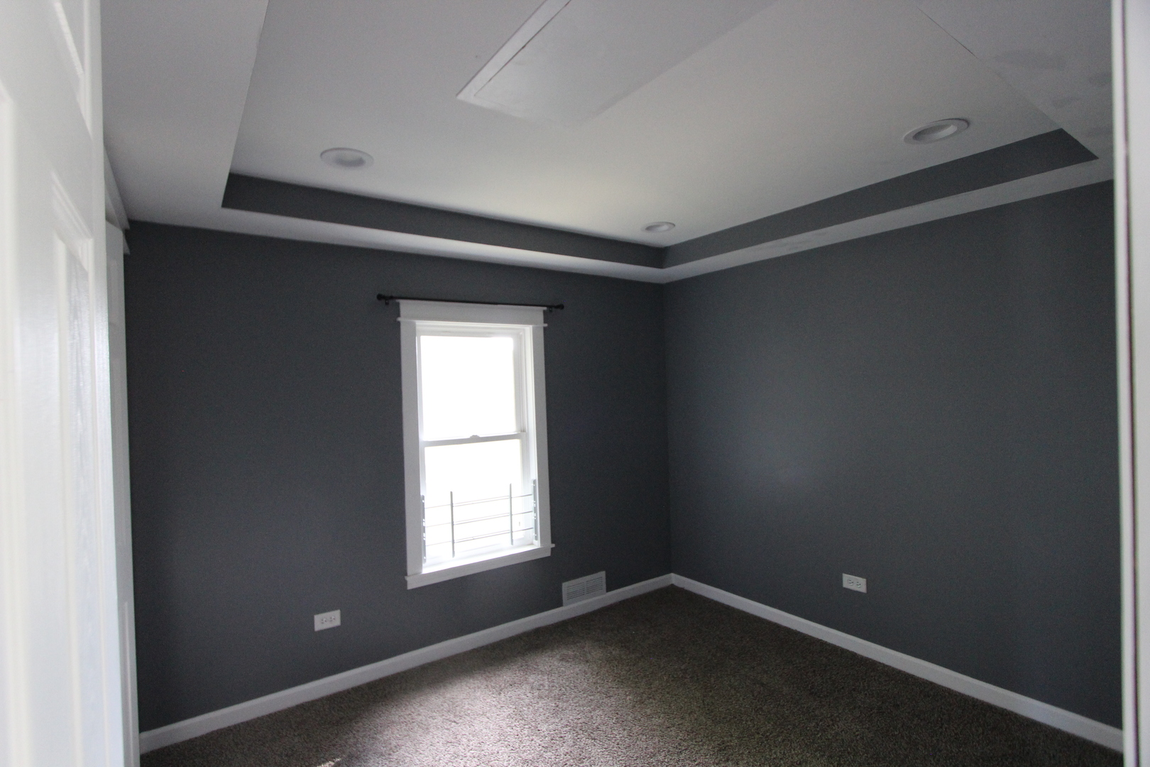 633 1/2 Whitney Boulevard Belvidere, IL 61008 - Photo 8 of 16 an empty room with a empty space and a window