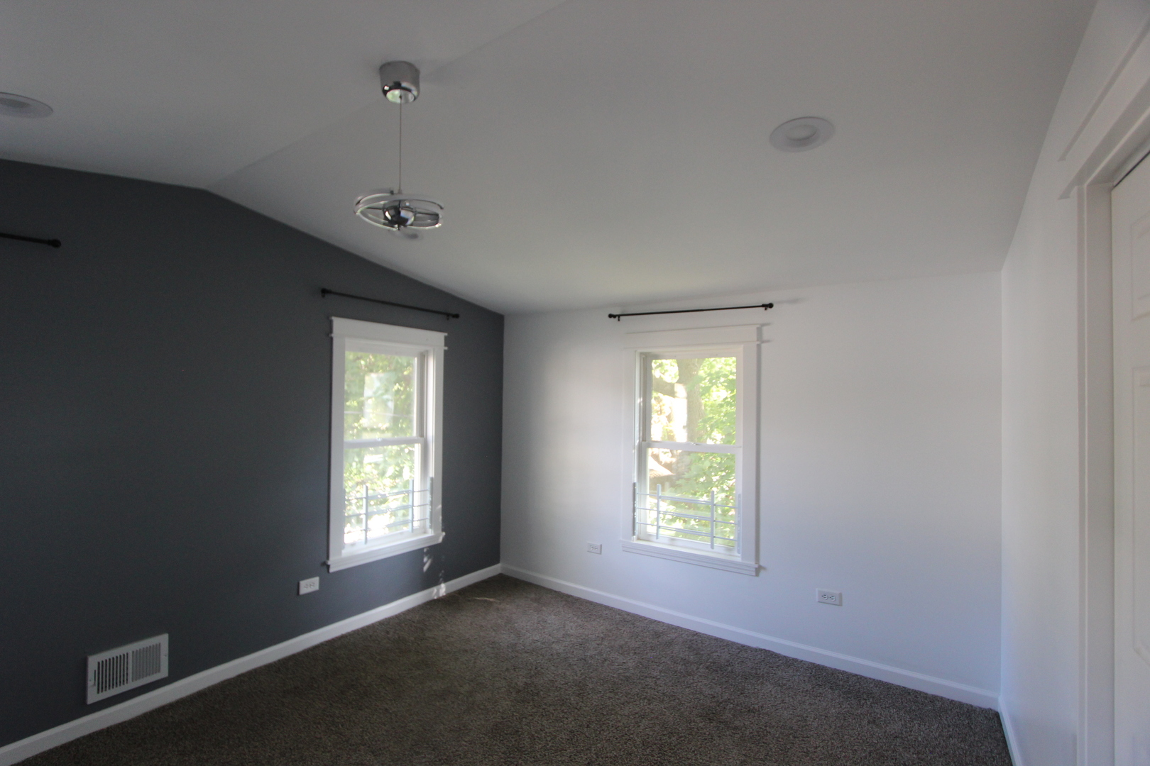 633 1/2 Whitney Boulevard Belvidere, IL 61008 - Photo 9 of 16 a view of an empty room with a window