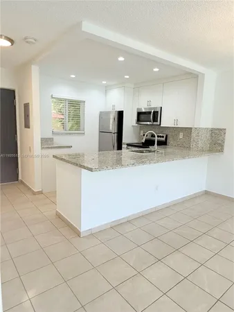 $1,845 | 7820 Camino Real, Unit J104, Miami, FL 33143