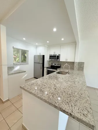 $1,845 | 7820 Camino Real, Unit J104, Miami, FL 33143