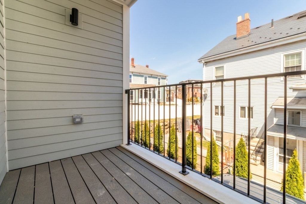 15 Tanglewood Road, Unit A Boston, MA 02126 - Photo 9 of 28 a view of wooden balcony