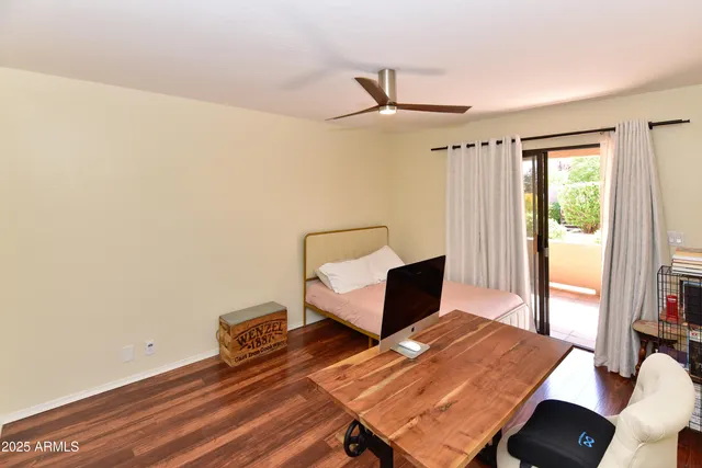 a workspace with furniture and window