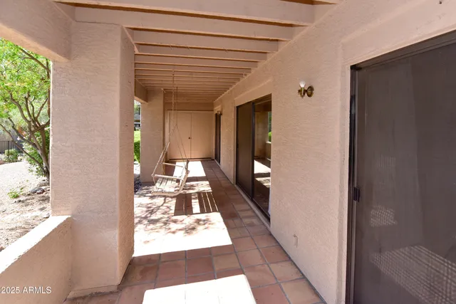 a view of entryway with a front door