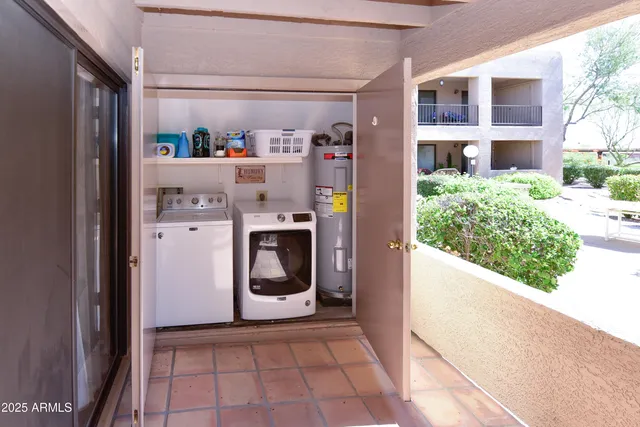 a utility room with dryer and washer