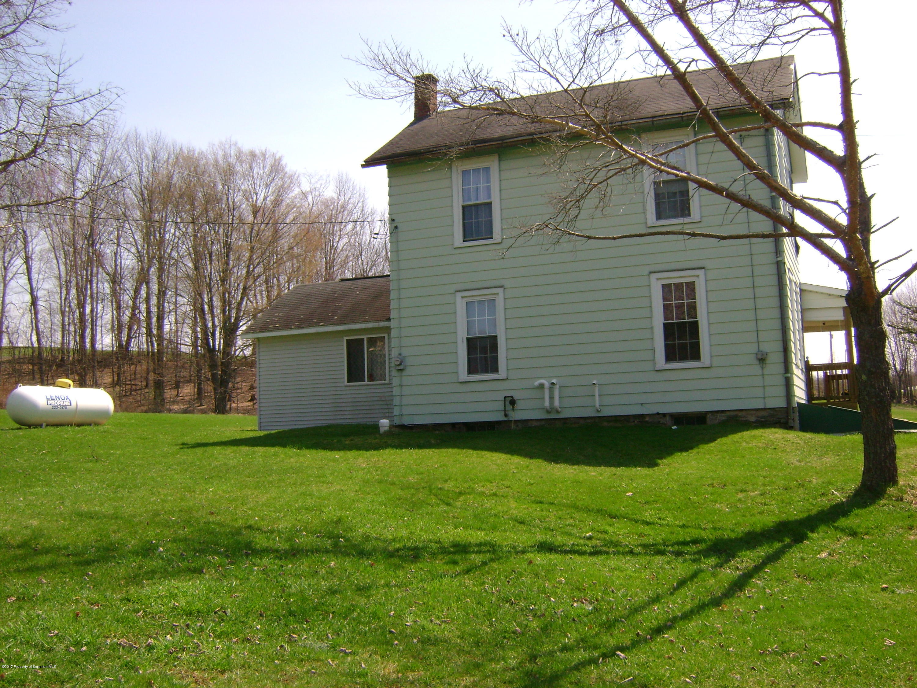 14879 Dimock To Nicholson Road Hop Bottom, PA 18824 - Photo 18 of 21 a view of a house with a yard