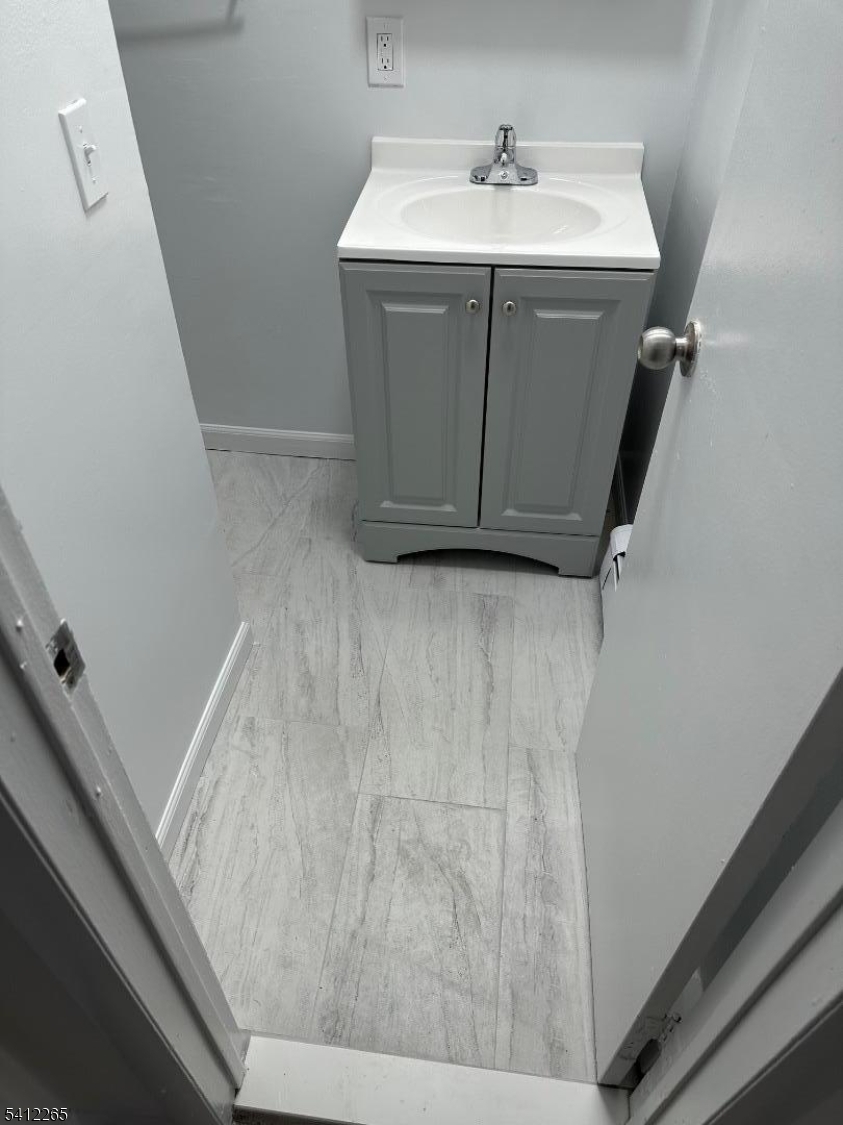 57 Harrison Street Nutley, NJ 07110 - Photo 6 of 8 a utility room with a sink