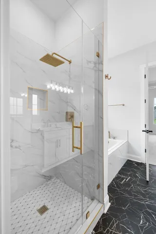 a view of room with a ceiling fan and entryway