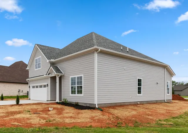 a view of a house with yard