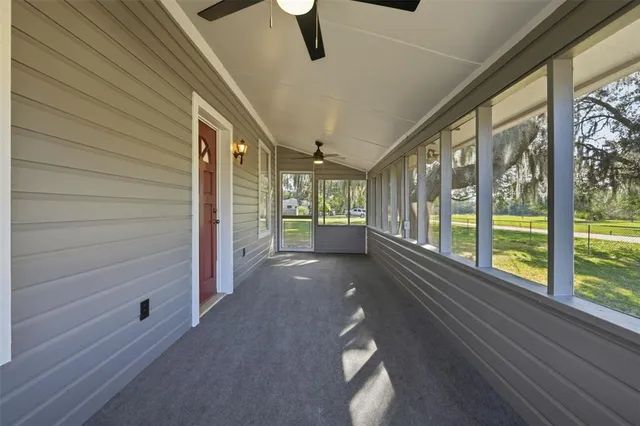 a view of gallery with wooden floor